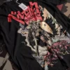 Berserk Skull Knight T-Shirt with bold manga artwork and Japanese text